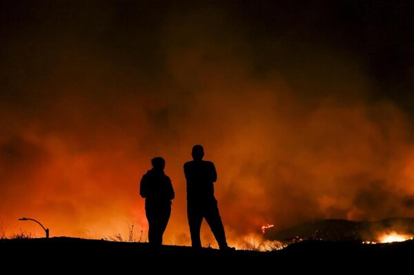 Hughes Wildfire Forces Mass Evacuations in Los Angeles